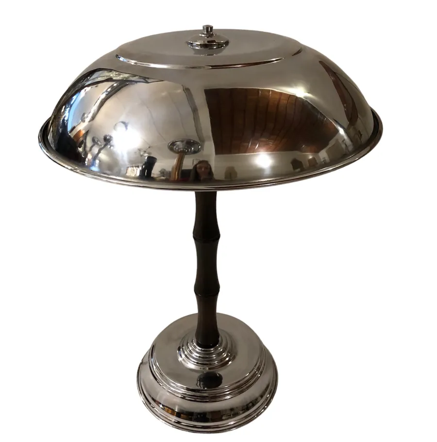 Two antique table lamps with shiny details in a cozy setting.
