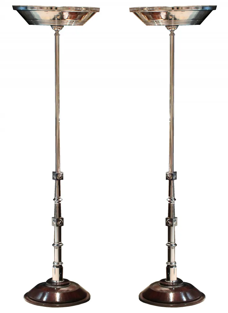 two antique floor lamps in a classic setting
