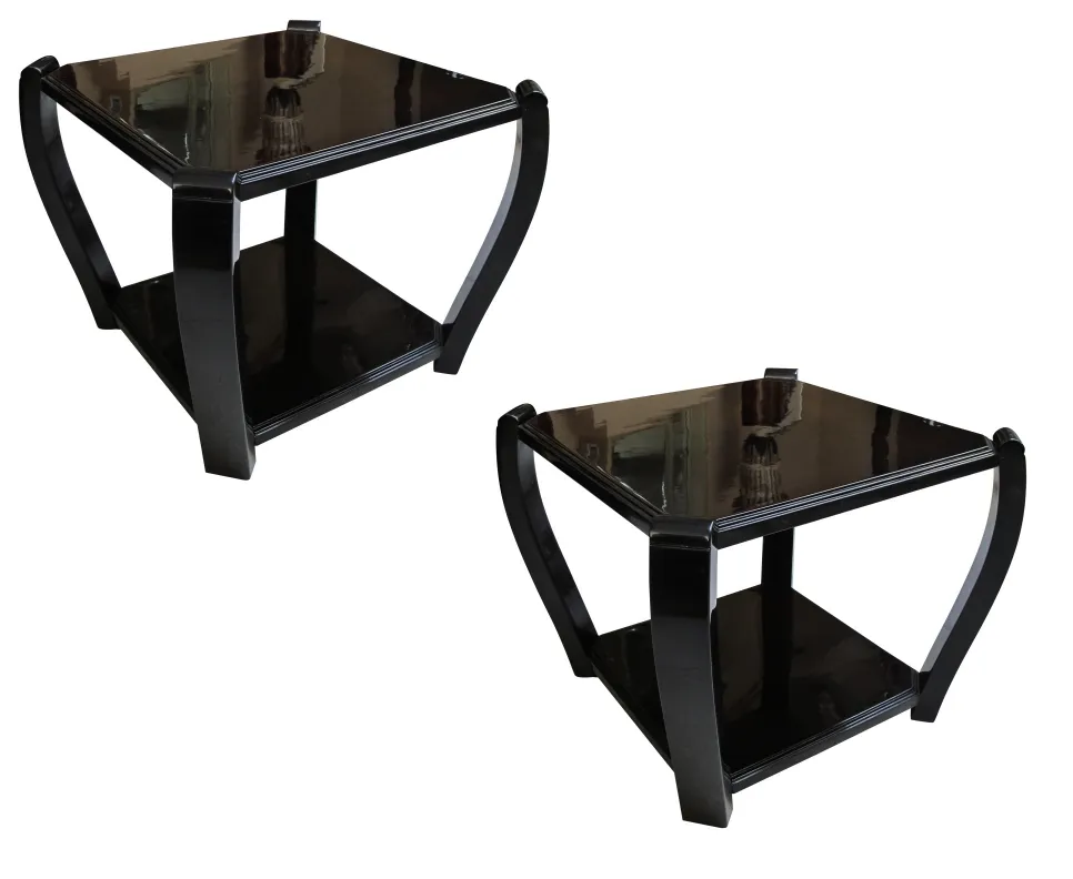 two antique small tables with a glossy surface and elegant design