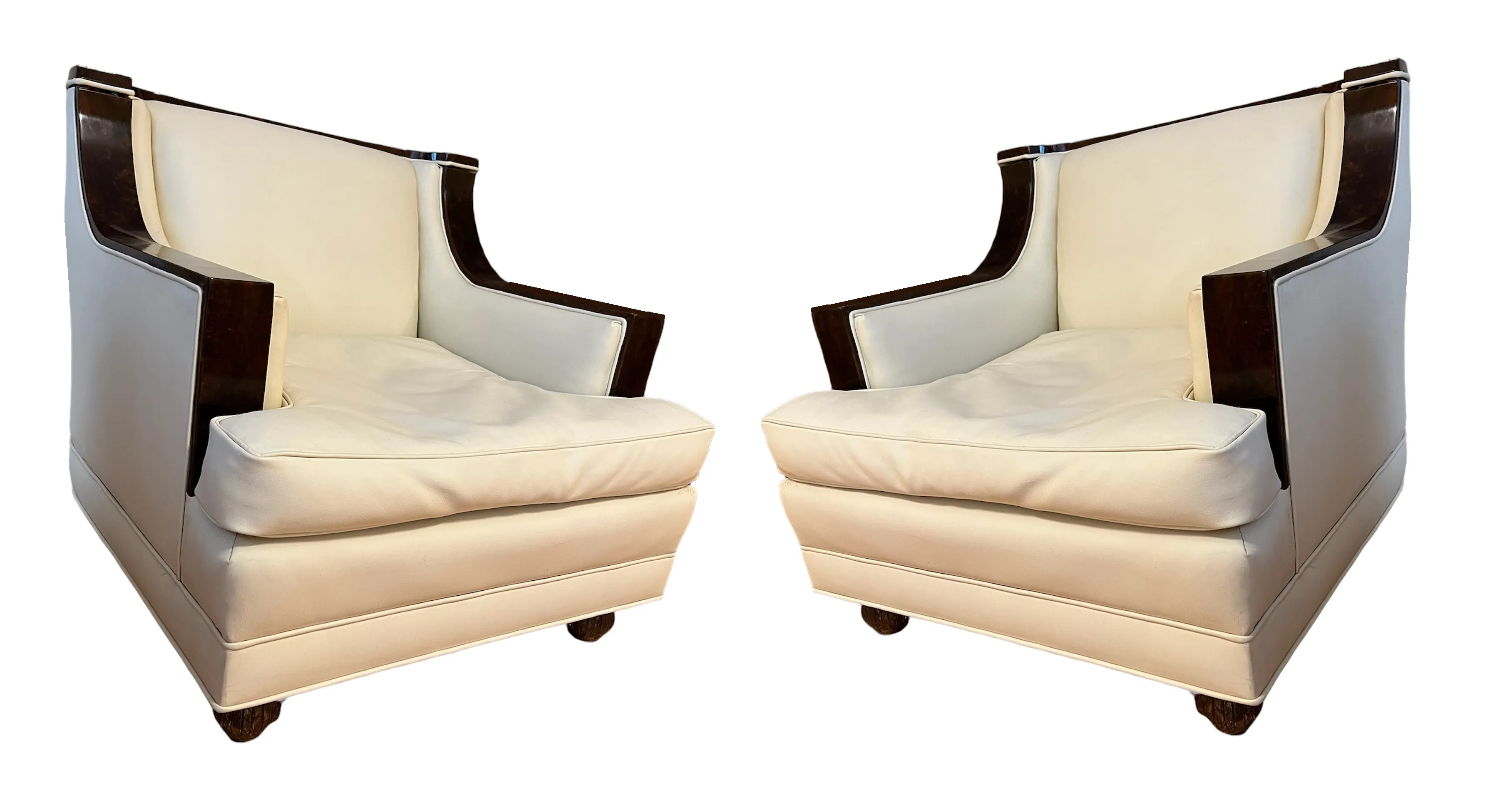 Two antique armchairs with modern design in a bright setting