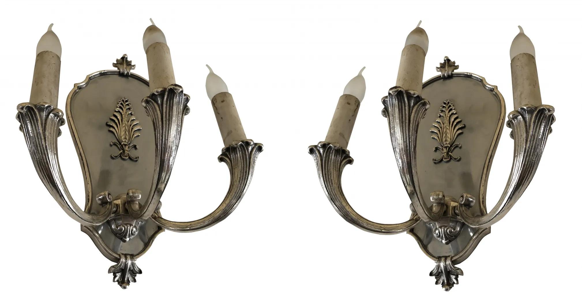 Antique pair of sconces with decorative elements, perfect for any room.