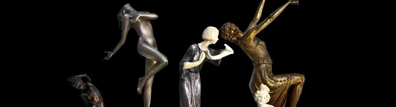 Various antique carousel animal sculptures in different artistic styles and dynamic poses in a neutral background.