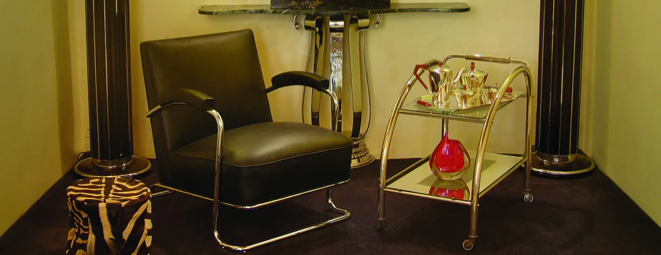 Modern black armchair in a stylish interior setting.