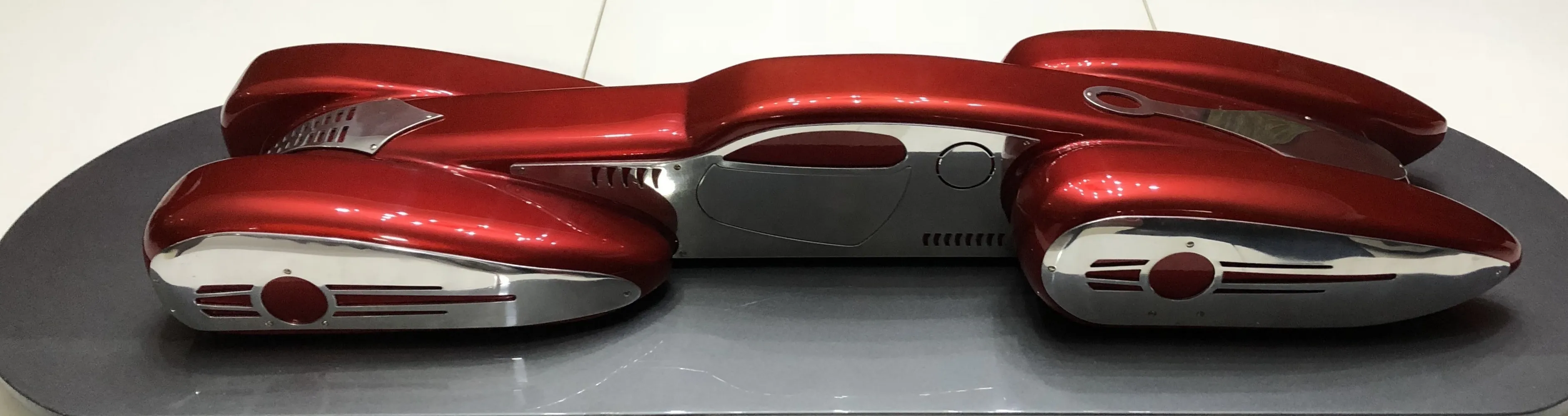 bright red classic car model with chrome details