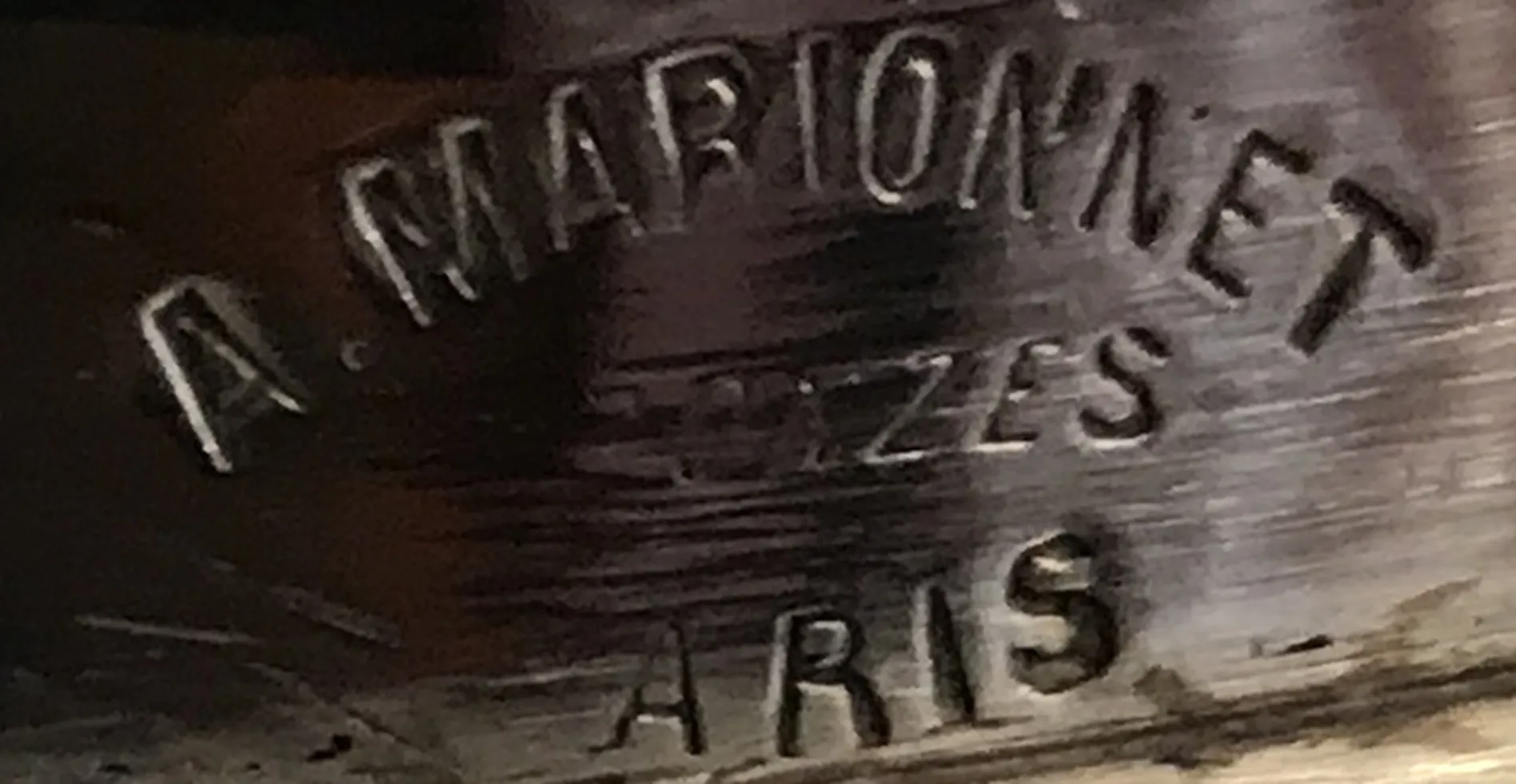 Antique seal A. Marionnet Bronzes Paris showcasing intricate details.