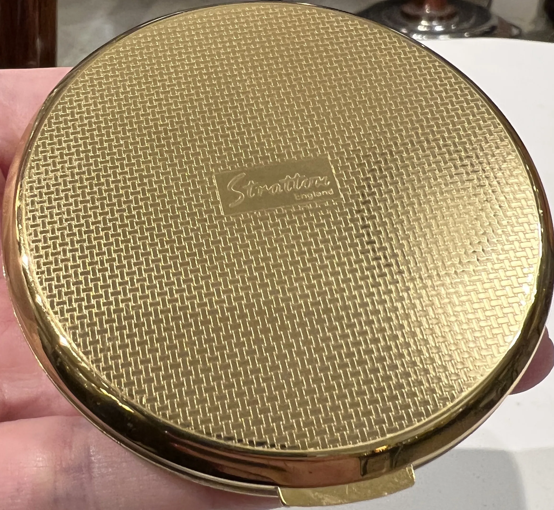 antique decorative seal from Stratton, England, golden