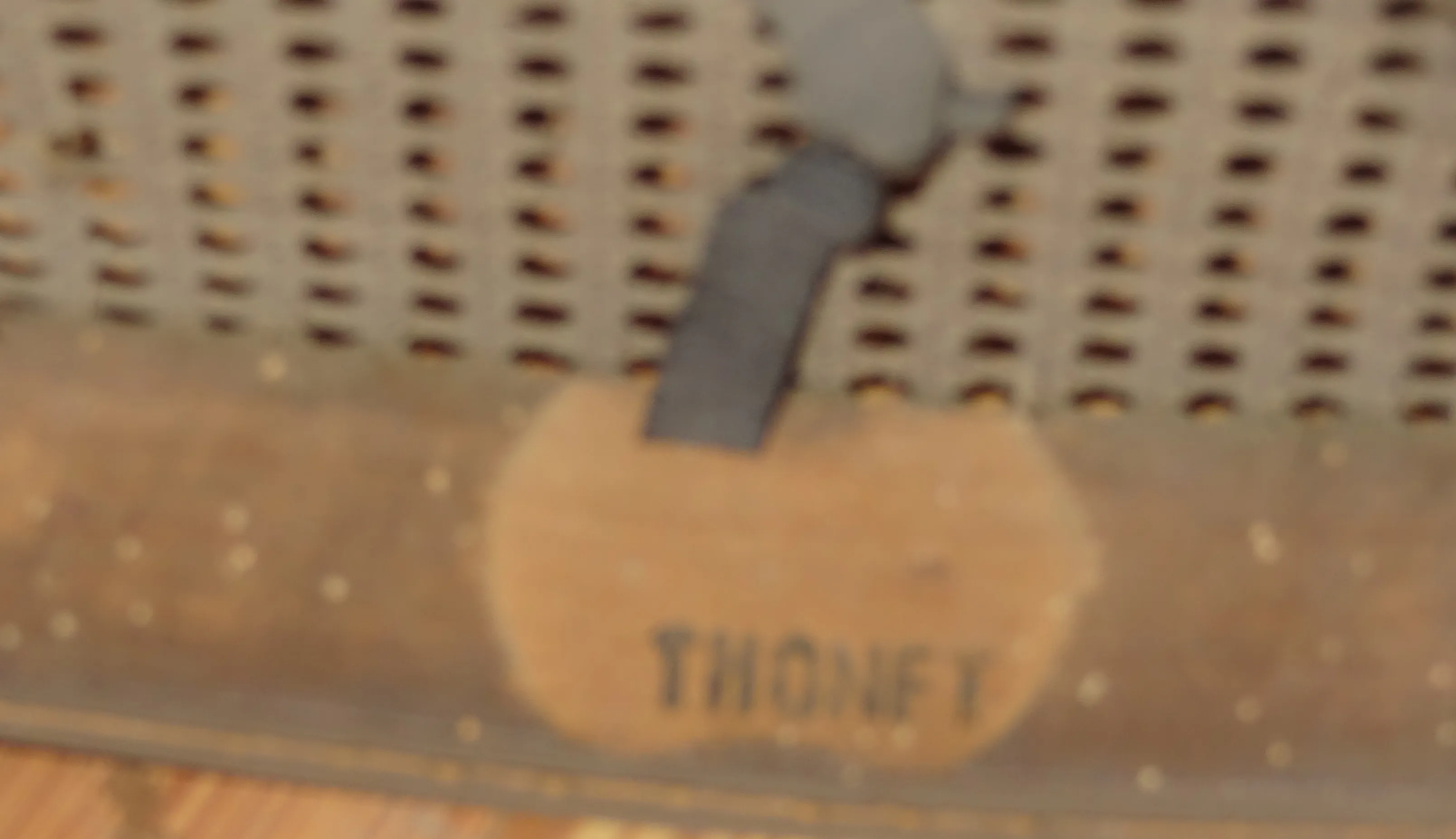 antique Thonet seal with clear design in neutral setting