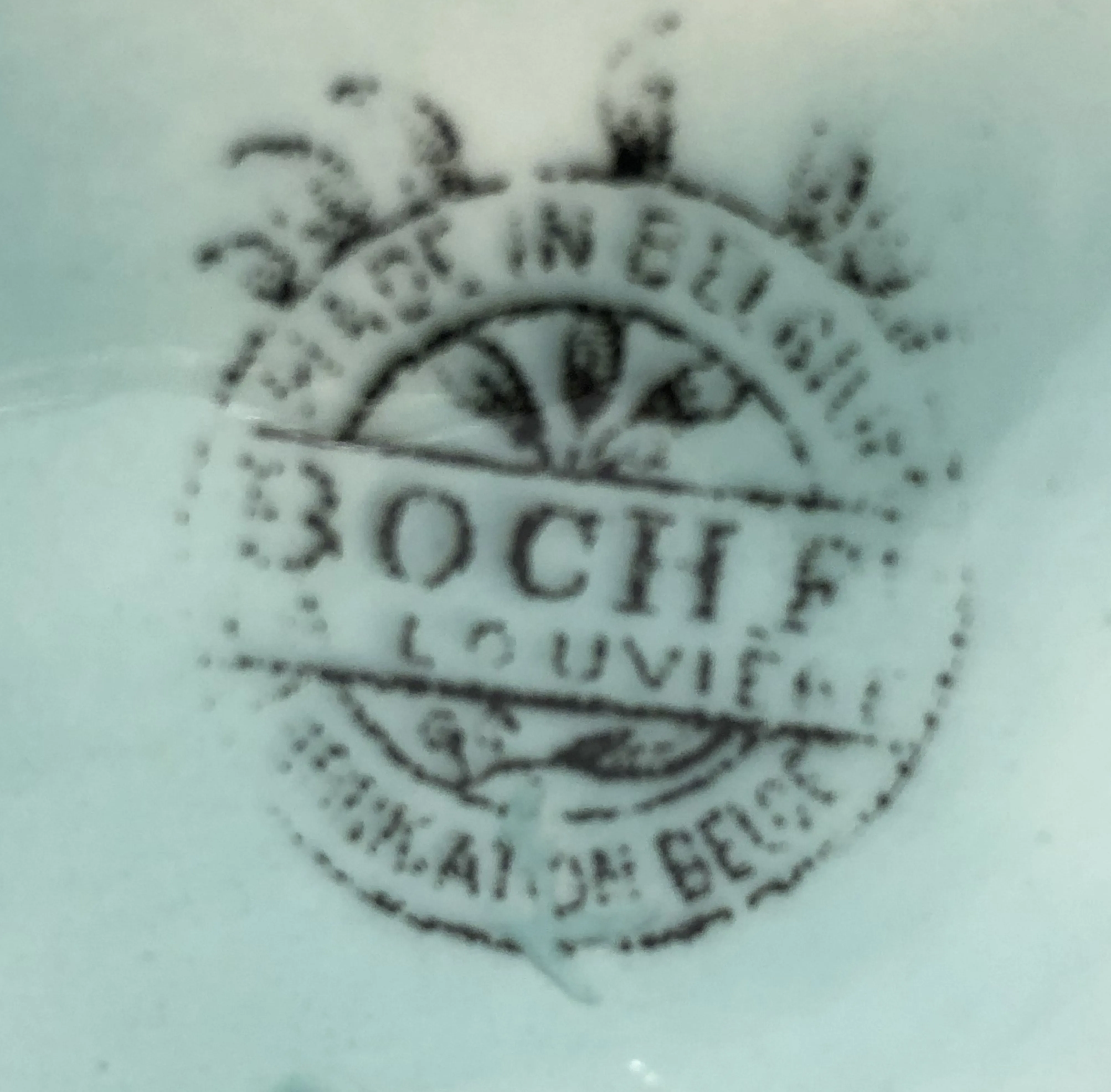 Detail of an antique Boch seal with floral design