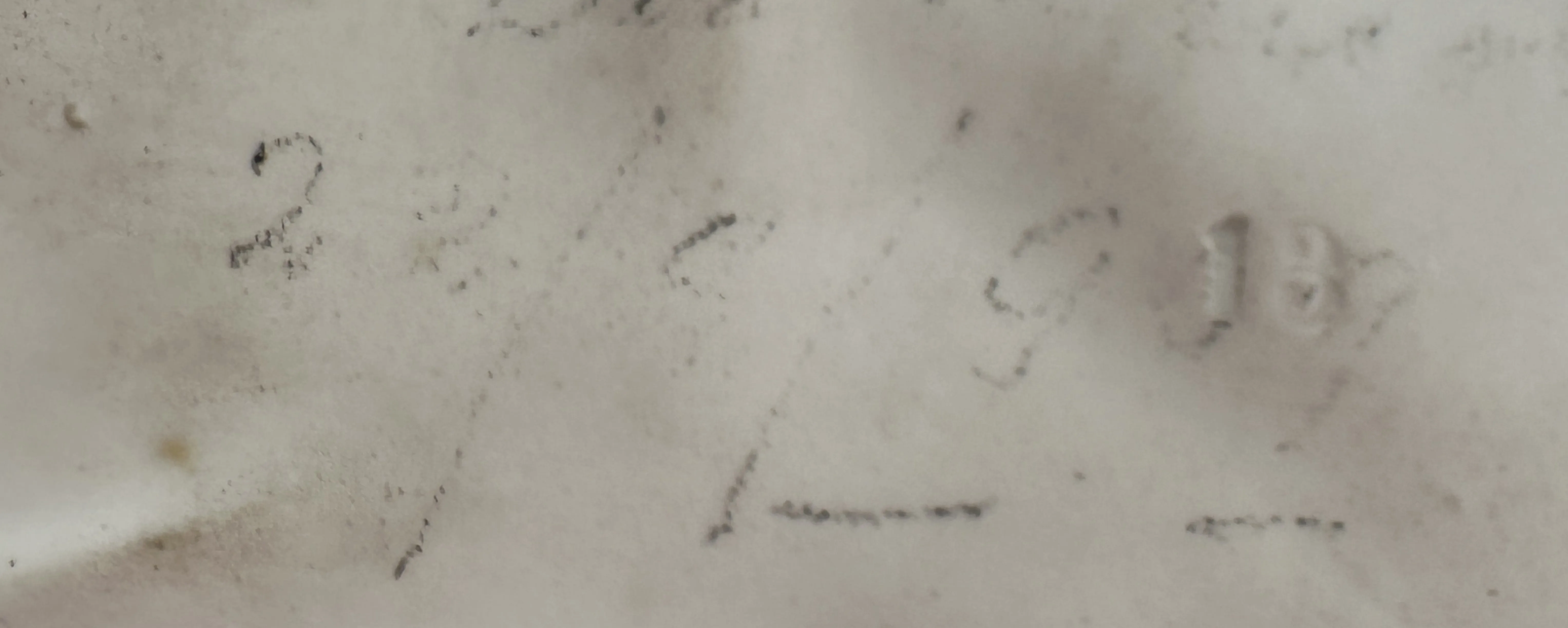 Antique seal with inscription details, clear background