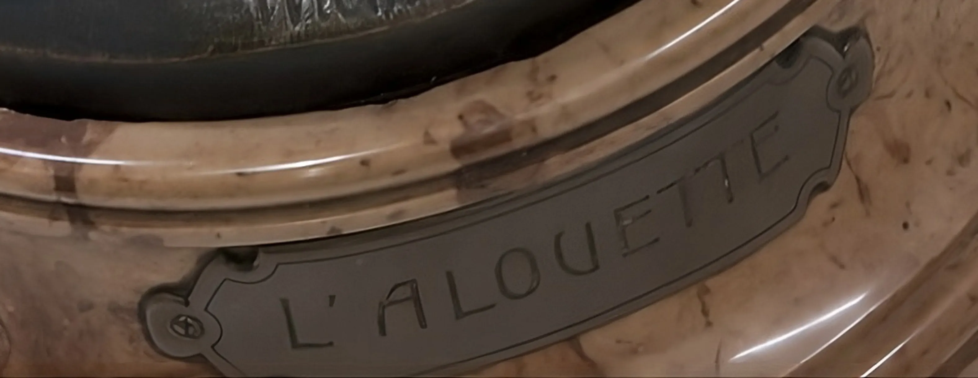 antique seal with l´alouette inscription on decorative background