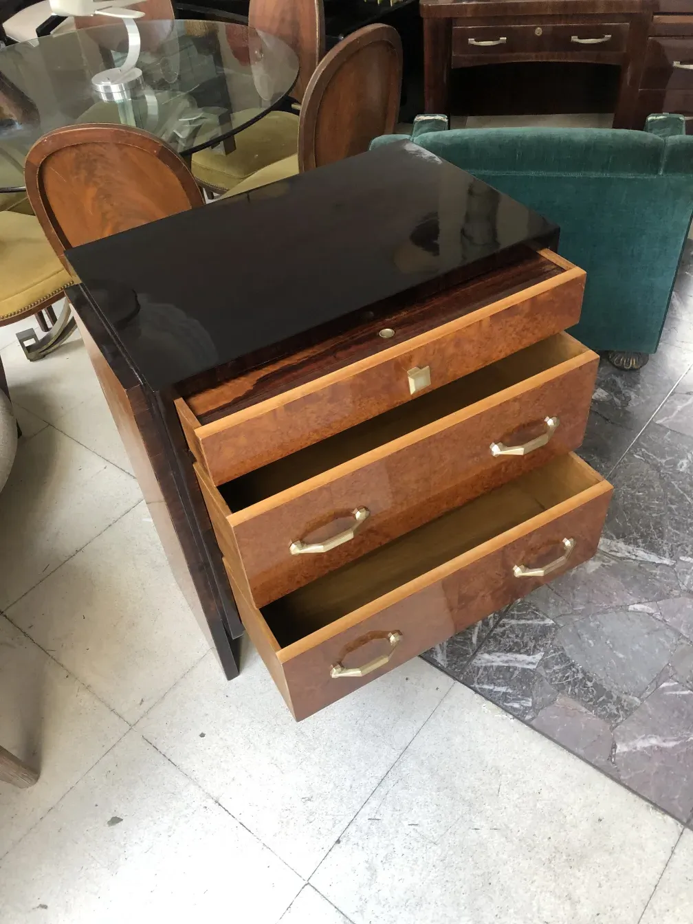 Antique wooden cabinet with three elegant drawers, perfect for home decor.