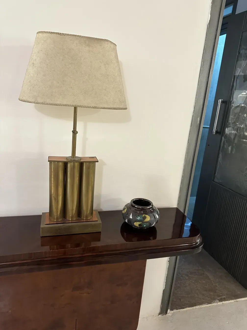 Antique decorative ceramic with colorful design on the table.