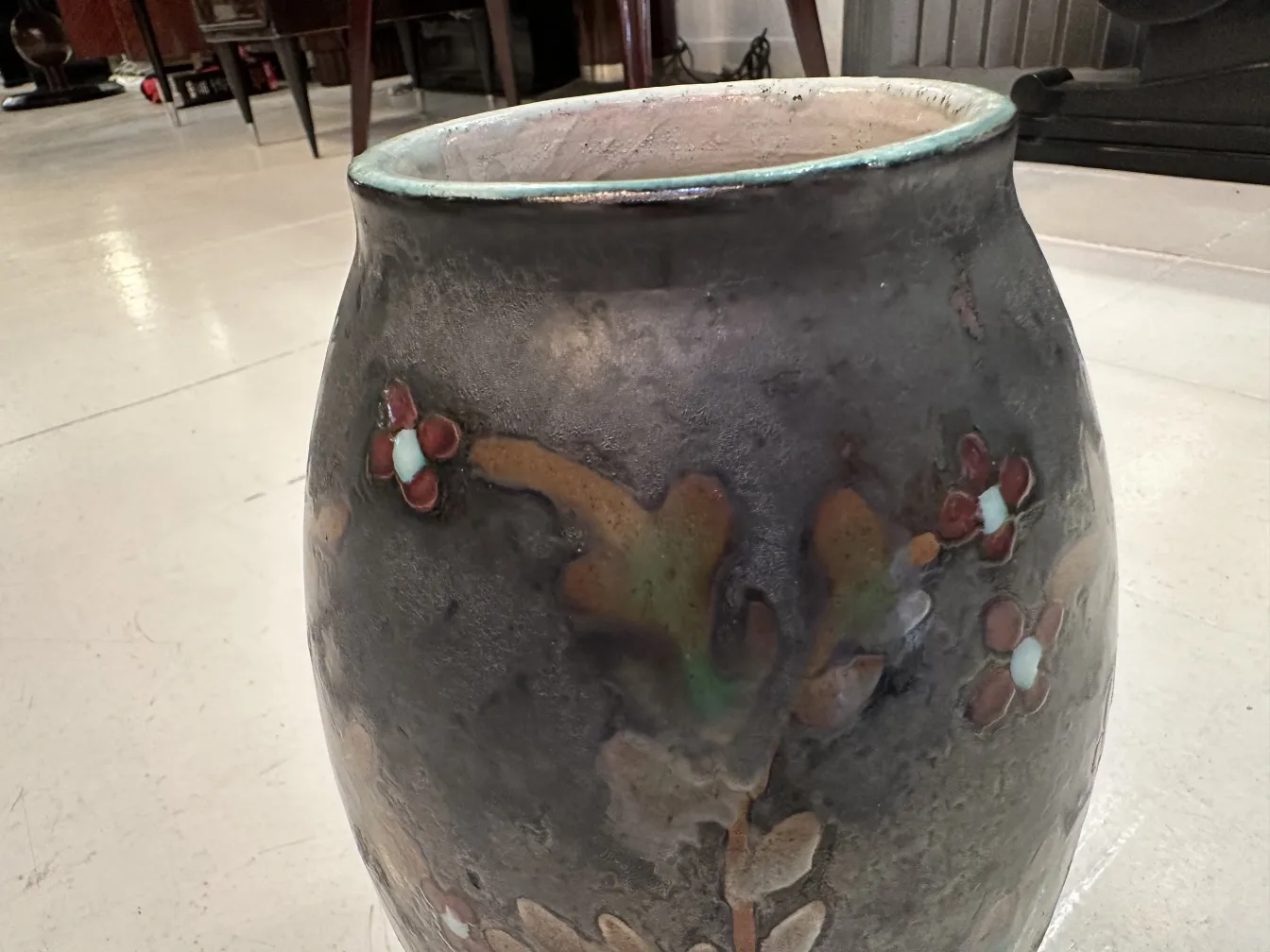 Antique ceramic decorated with flowers, unique style.