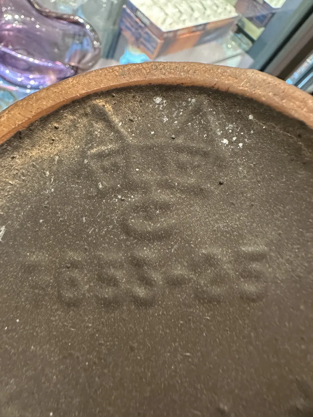 Antique ceramic with visible markings and unique details