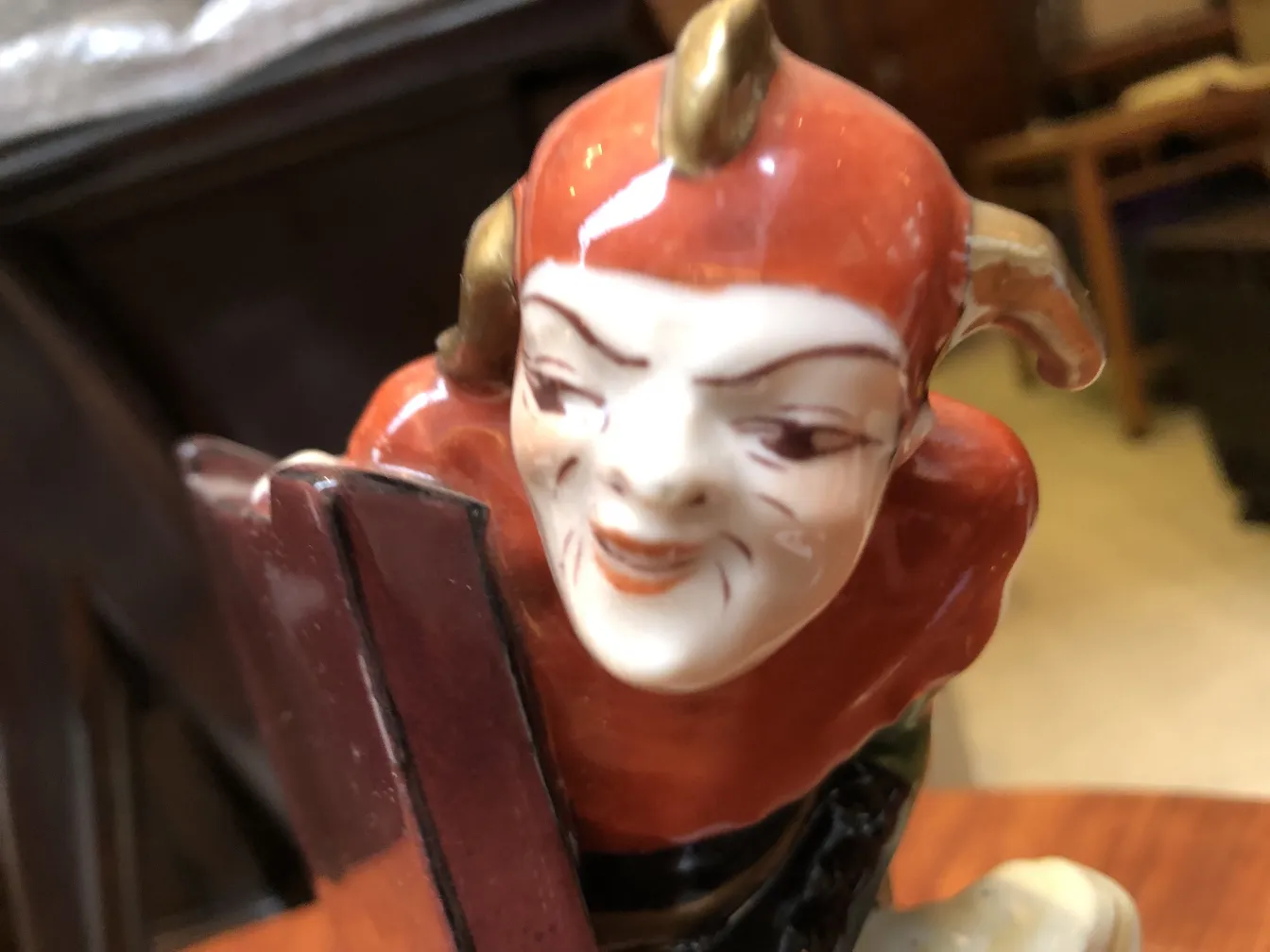 Antique ceramic figure with artistic and colorful details