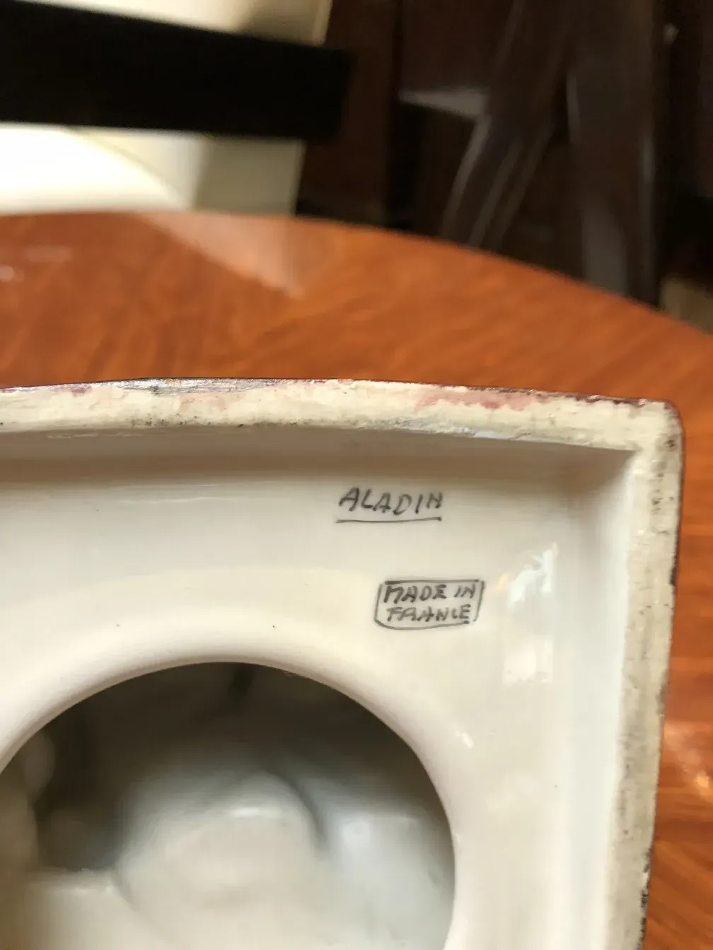 Antique ceramic with artisanal details, Aladin, France, notable for its finish.