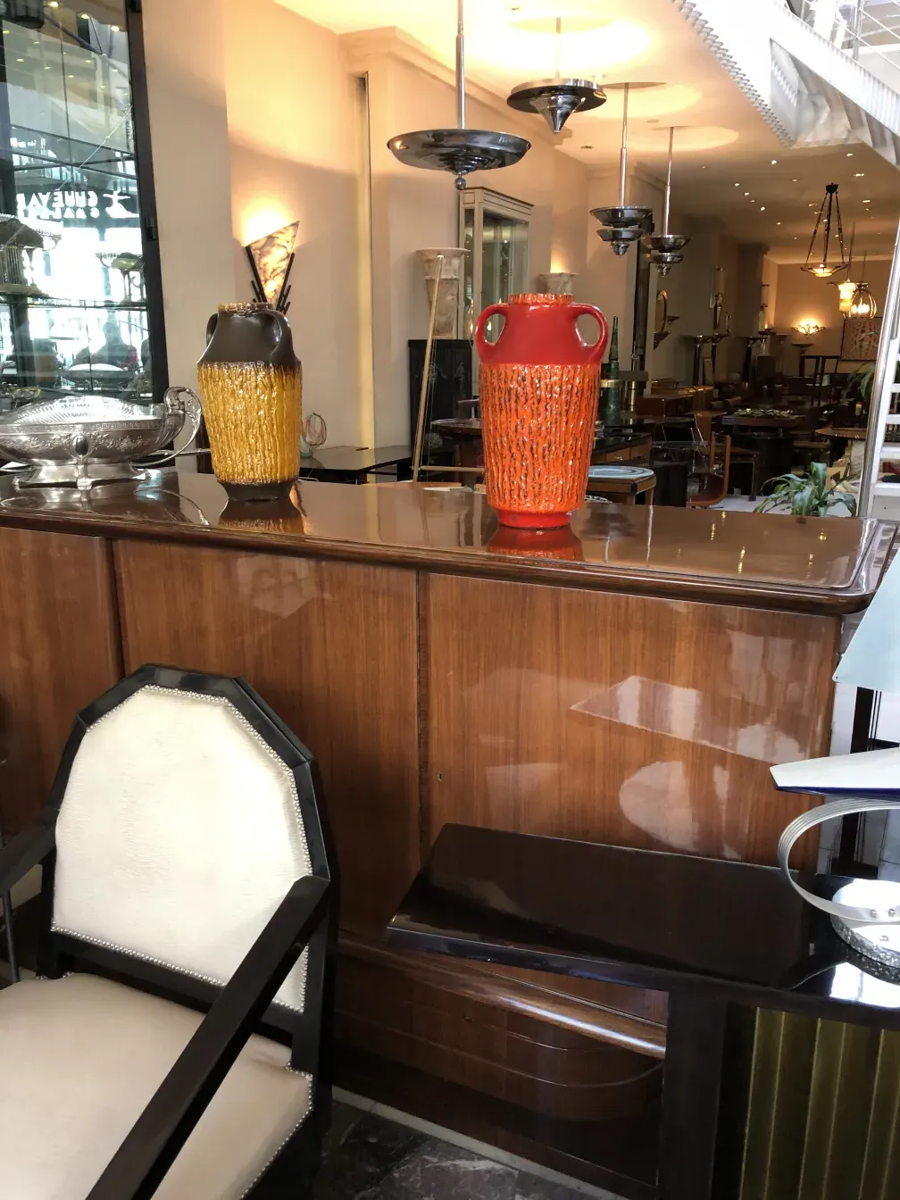Three antique ceramic vases in an elegant setting