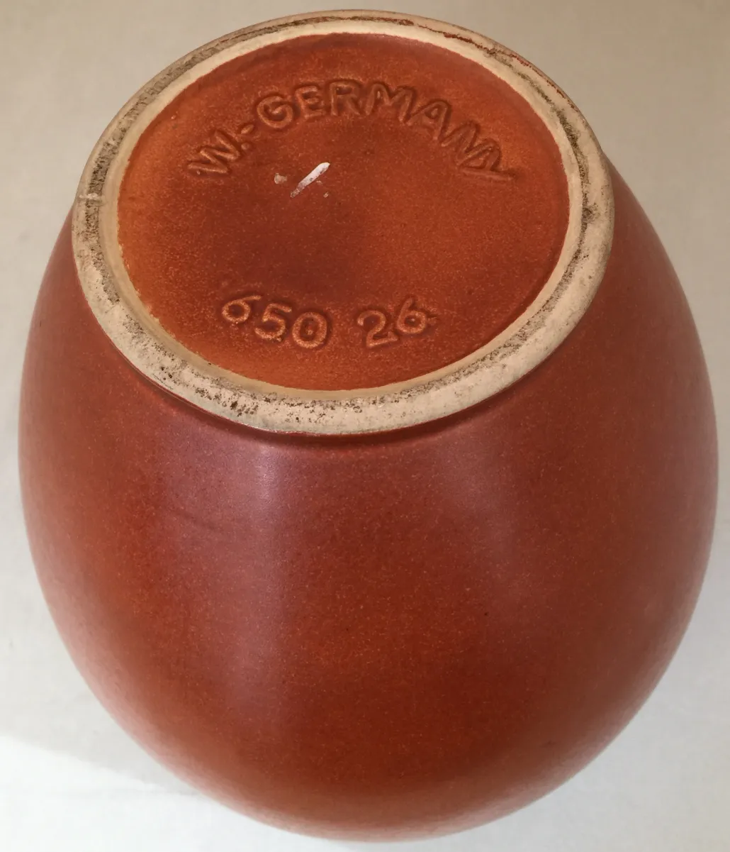 Antica ceramica di Bertelmann, colore terracotta, forma rotonda.