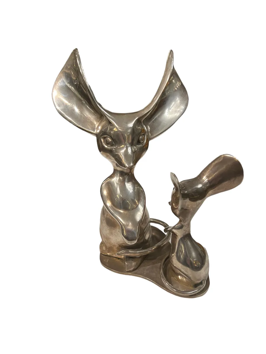antique sculpture of an animal with large ears, unique