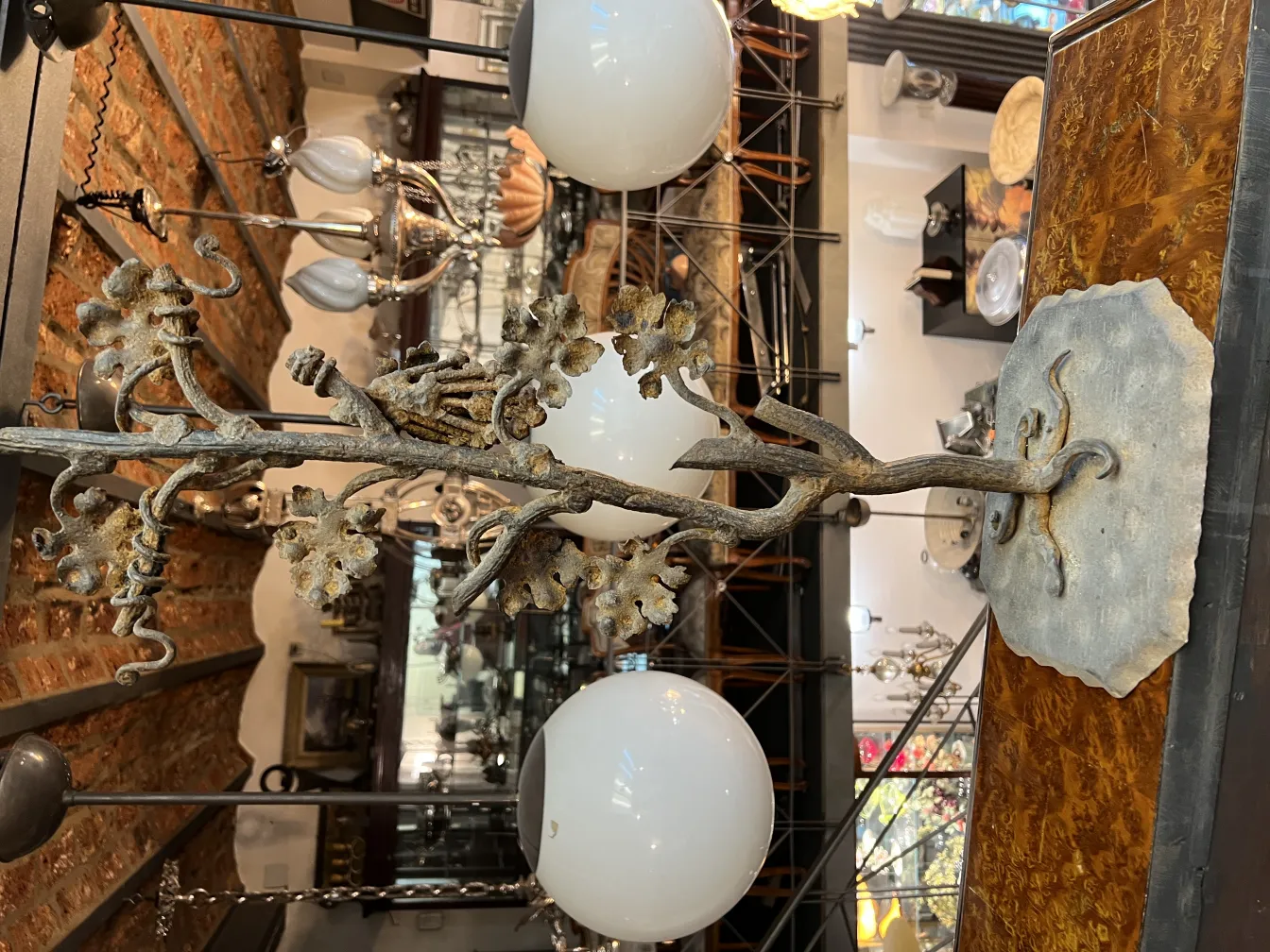 Antique sculpture with decorative branches in a vintage setting