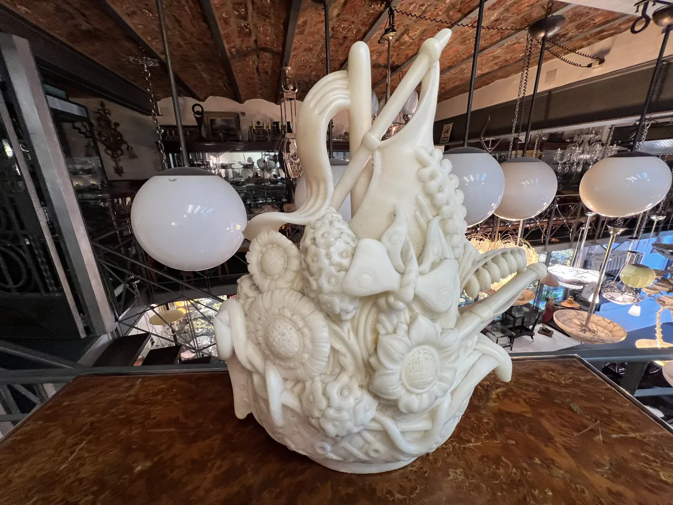 Antique sculpture featuring floral details and natural shapes, decorative