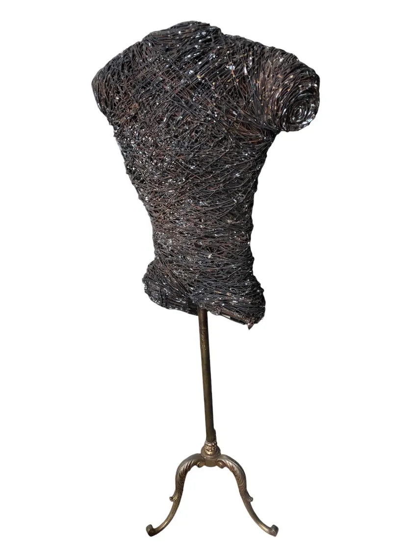 antique torso sculpture with intricate details and a golden base, perfect for decoration