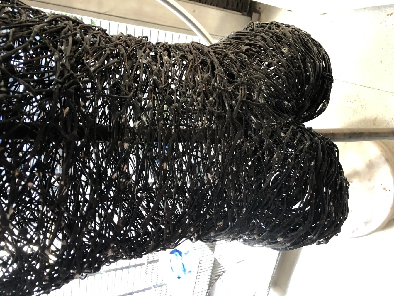 ancient sculpture with complex structural form, black