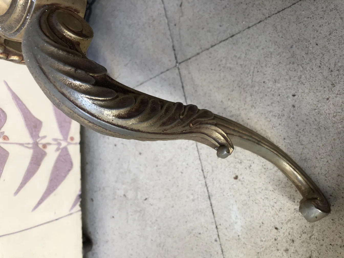 detail of an antique sculpture with a decorative design