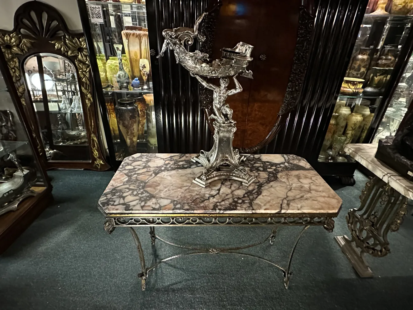 Decorative antique sculpture on marble table