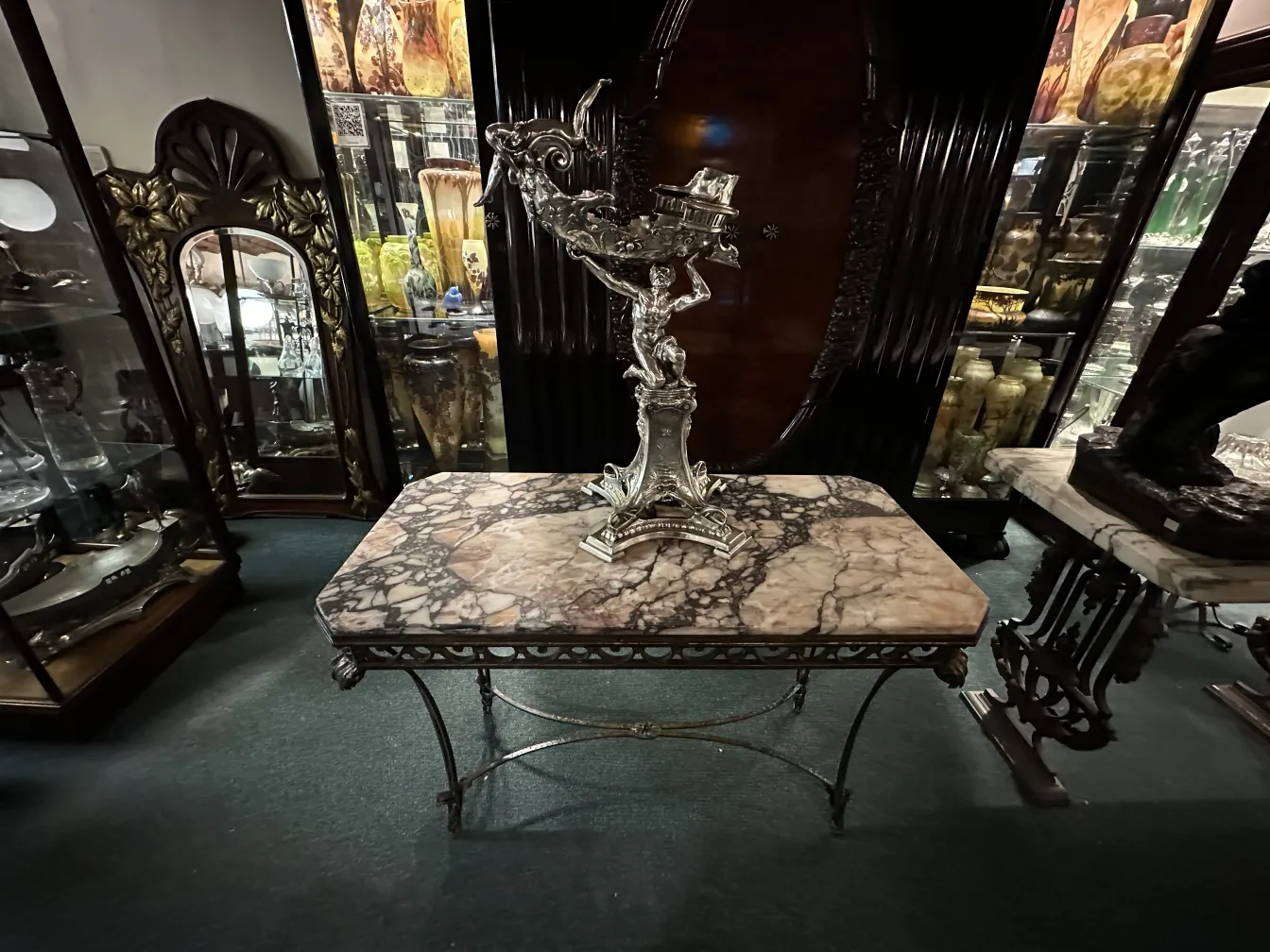 antique sculpture with intricate details in decorative surroundings