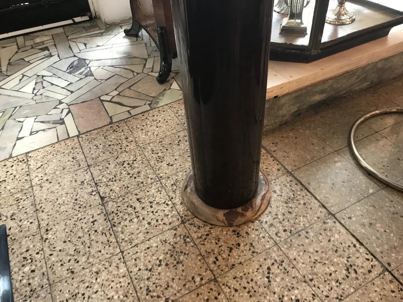 Ancient dark column in indoor setting