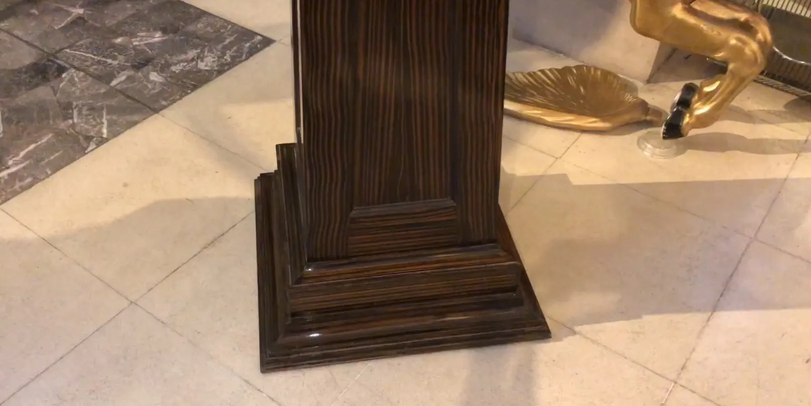 antique column with decorative base in the room