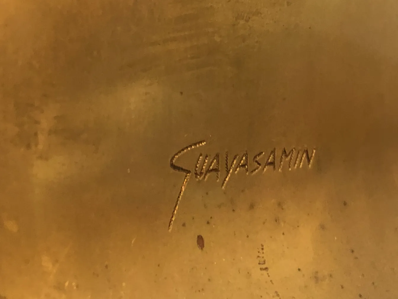antique sculpture with signature, visible detail of the work