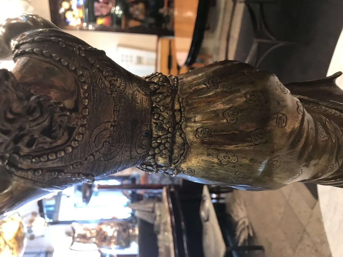 details of an antique sculpture with intricate patterns