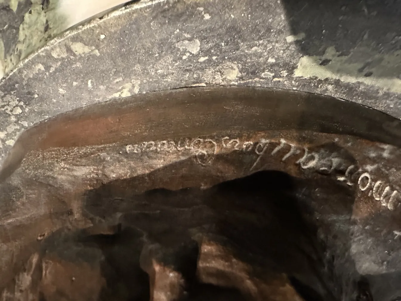 Ancient sculpture with visible artistic details.