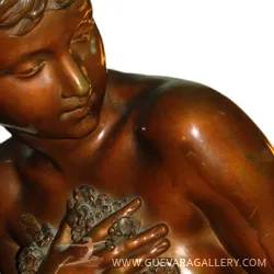 antique sculpture of a woman with flowers on her chest
