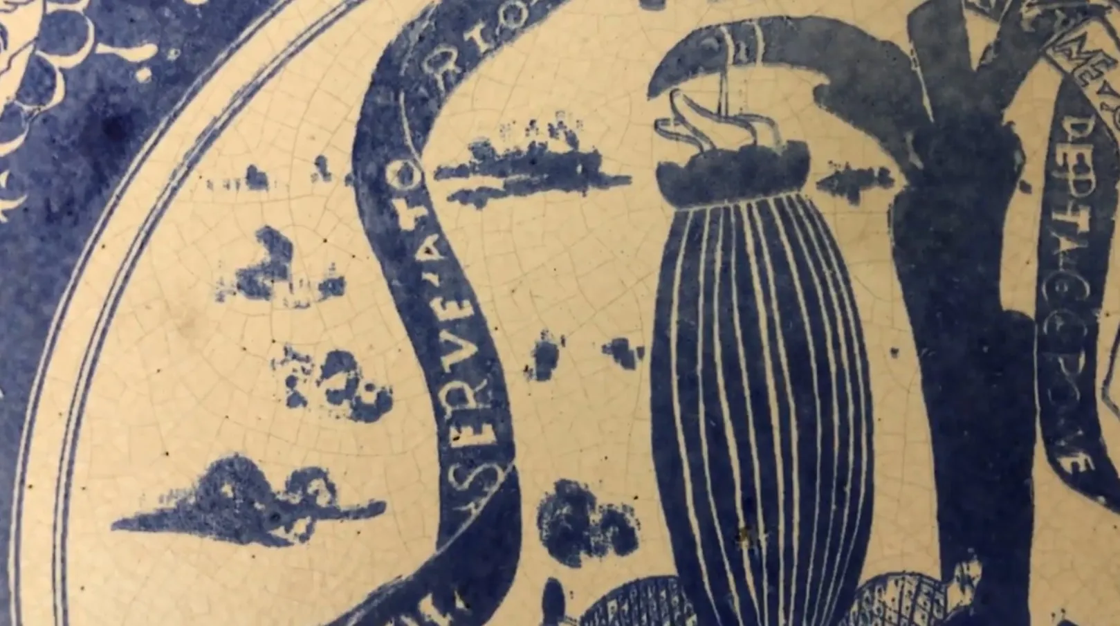 Antique ceramic with blue and white designs.