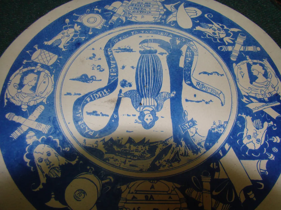 Antique blue and white ceramic plate with intricate details