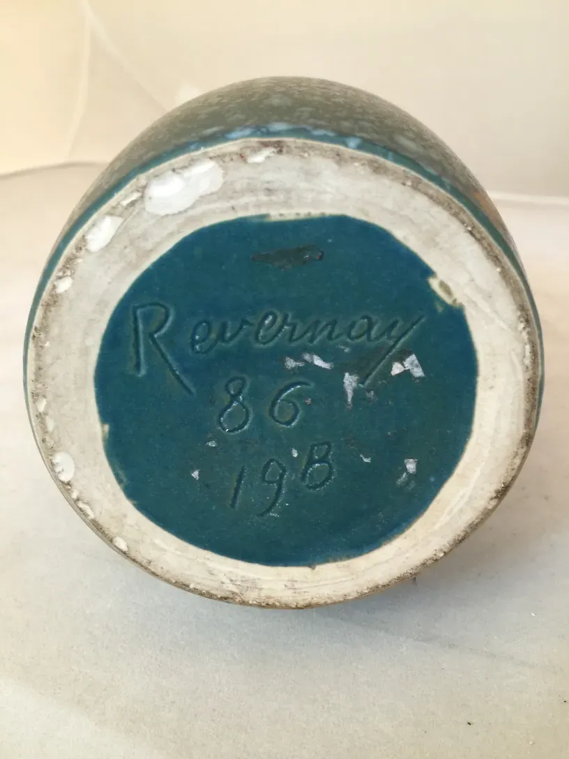 Antique Revernay ceramic with signature on the bottom.