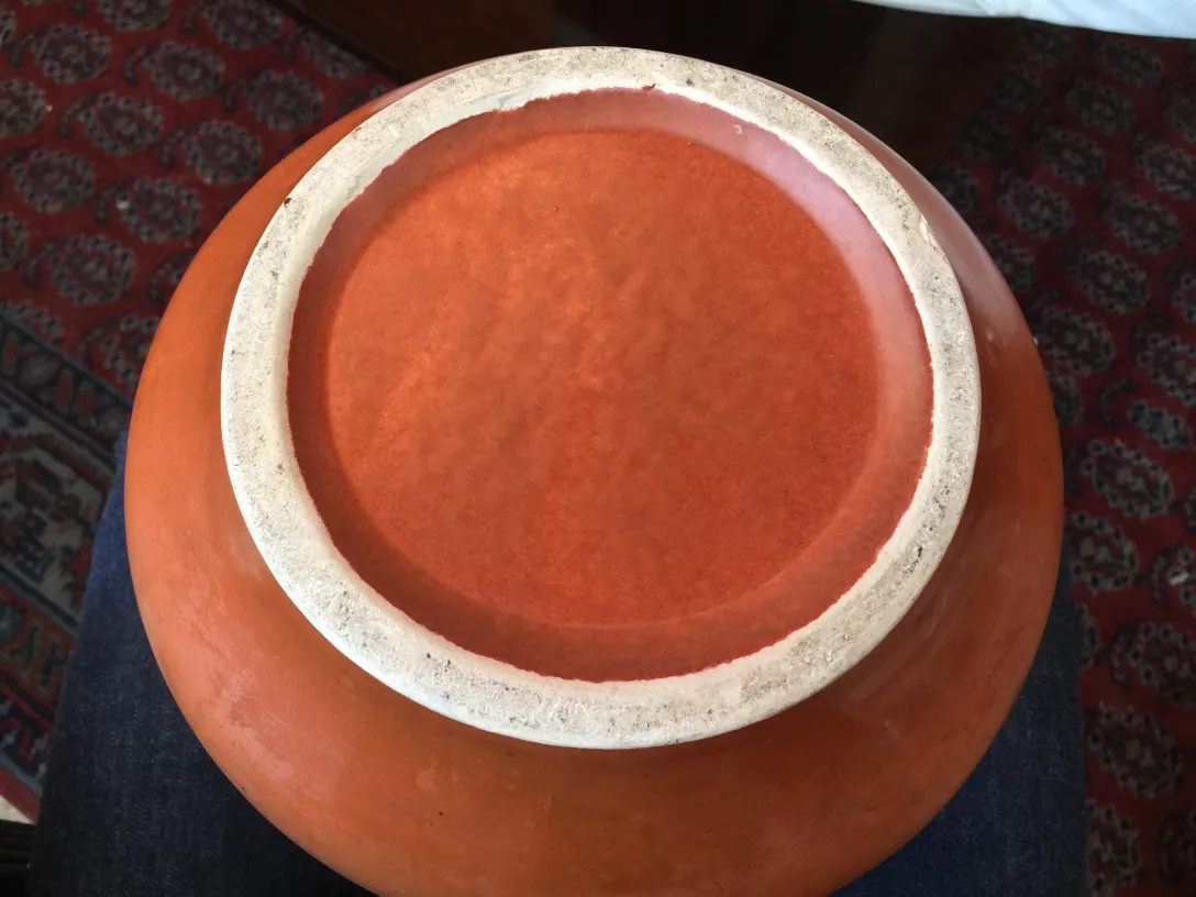 Top view of an antique artisanal terracotta ceramic.