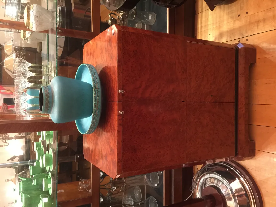 Antique turquoise ceramic in a display setting