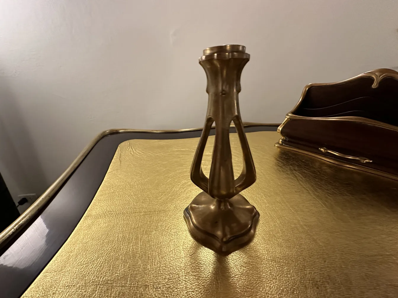 antique desk by Gustave Keller at Orfevre, showcasing an elegant decorative design, located at 22 rue Joubert