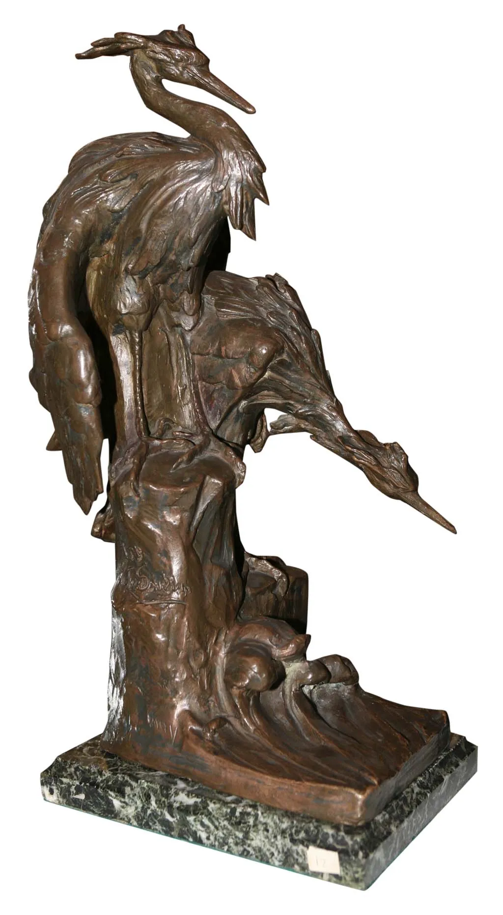 sculpture ancienne d'oiseaux avec base décorative