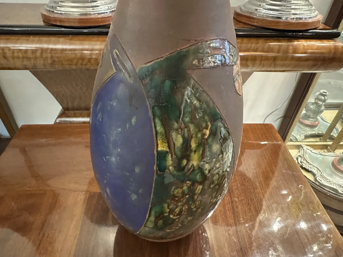 Antique ceramic vase with blue and green tones