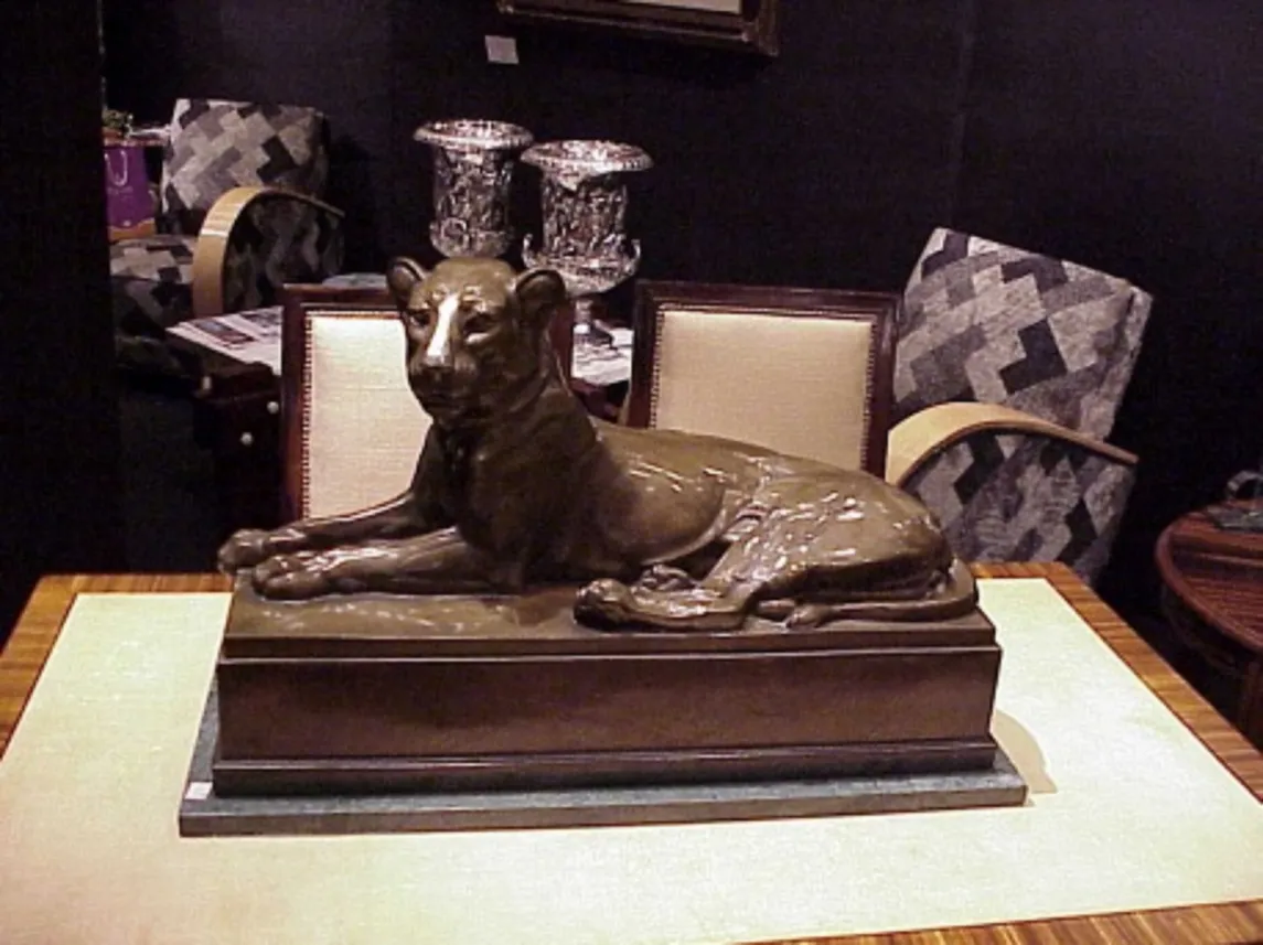 antique feline sculpture in an elegant setting