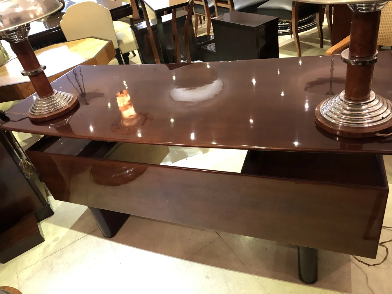 Shiny antique desk with lamp and cozy atmosphere