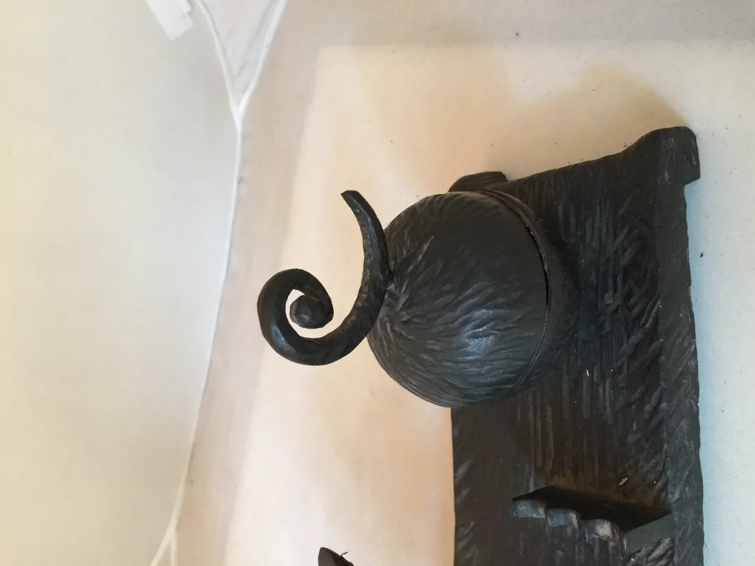 antique decorative sculpture on light background