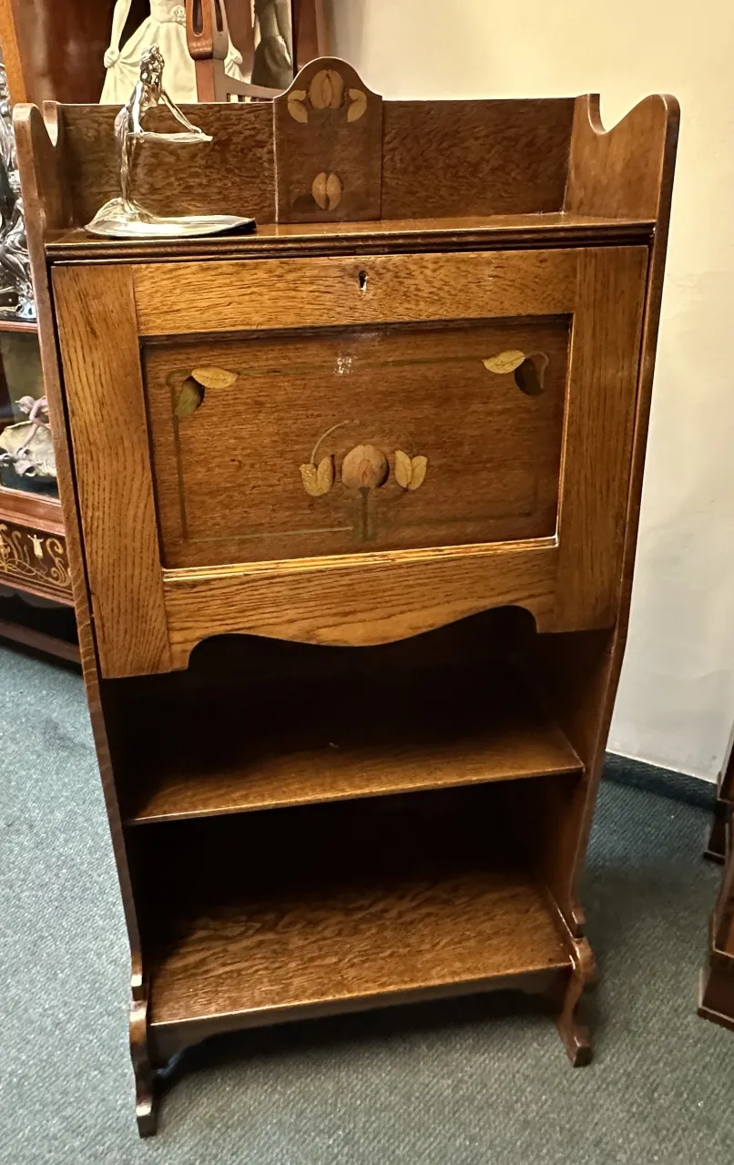 antique desk in wood with floral decoration