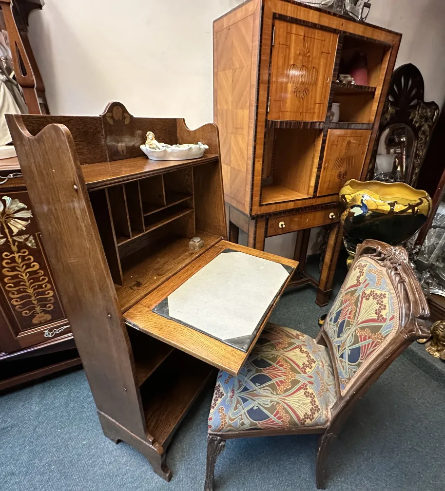 antique desk with compartments and doors, classic setting