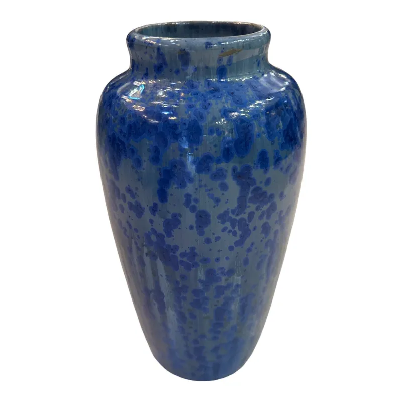 Decorative blue ceramic vase with speckles